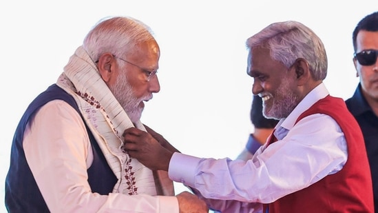 PM Modi was felicitated by Jharkhand Chief Minister Champai Soren at the foundation stone laying and inauguration of multiple developmental projects, in Sindri, Dhanbad district.(PTI)