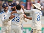 India's Kuldeep Yadav, center, back to the camera, is hugged by captain Rohit Sharma India's Kuldeep Yadav, center, back to the camera, is hugged by captain Rohit Sharma