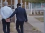 Blaze Media Investigative Journalist Steve Baker (middle) has been taken into FBI custody for his January 6 reporting.