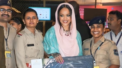 Rihanna poses at Jamnagar Airport as she leaves after performing at Anant Ambani and Radhika Merchant's pre-wedding bash. Rihanna poses at Jamnagar Airport as she leaves after performing at Anant Ambani and Radhika Merchant's pre-wedding bash.