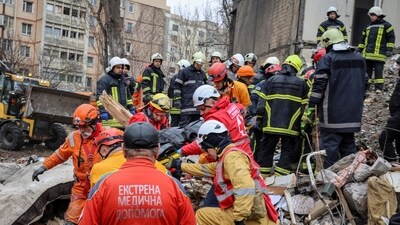 Rescuers remove the body of a local resident at the site of a residential building heavily damaged by a Russian drone strike, amid Russia's attack on Ukraine, in Odesa, Ukraine March 2, 2024. (Reuters)