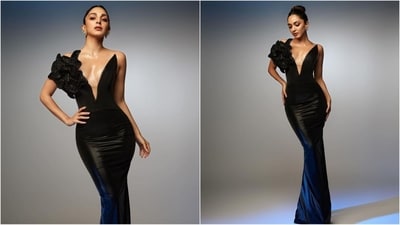 Kiara exudes timeless elegance in a stunning black bodycon gown. The dress has a striking plunging neckline that highlights the exquisite embellishment of a tiny flower on the right shoulder. The bodycon fit hugs her body perfectly and accentuates her curves. With minimal make-up, diamond ear cuffs and her hair tied back in a bun, she looked breathtakingly beautiful. (Instagram) Kiara exudes timeless elegance in a stunning black bodycon gown. The dress has a striking plunging neckline that highlights the exquisite embellishment of a tiny flower on the right shoulder. The bodycon fit hugs her body perfectly and accentuates her curves. With minimal make-up, diamond ear cuffs and her hair tied back in a bun, she looked breathtakingly beautiful. (Instagram)