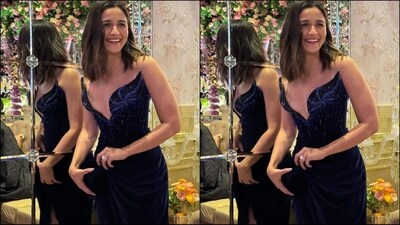 Alia Bhatt stuns in a gorgeous midnight blue corset gown that oozes glamour and allure. The diva's head-turning look was a total stunner and makes it onto the best-dressed list. Her exquisite gown, by luxury brand Andrea Brocca, features a plunging off-the-shoulder neckline and is embellished with intricate detailing and embroidery. Keeping the look simple, she accessorised with a statement ring, glam make-up and wavy open hair. (Instagram) Alia Bhatt stuns in a gorgeous midnight blue corset gown that oozes glamour and allure. The diva's head-turning look was a total stunner and makes it onto the best-dressed list. Her exquisite gown, by luxury brand Andrea Brocca, features a plunging off-the-shoulder neckline and is embellished with intricate detailing and embroidery. Keeping the look simple, she accessorised with a statement ring, glam make-up and wavy open hair. (Instagram)