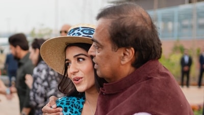 Mukesh Ambani gives a hug to Radhika Merchant. Day 2 of the pre-wedding festivities will include the dress code ‘jungle fever’. The schedule states the itinerary for Day 2, which has ‘a walk to the wild side’ and ‘a potpourri of desi activities.’ Mukesh Ambani gives a hug to Radhika Merchant. Day 2 of the pre-wedding festivities will include the dress code ‘jungle fever’. The schedule states the itinerary for Day 2, which has ‘a walk to the wild side’ and ‘a potpourri of desi activities.’ 