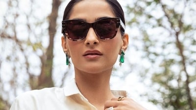 Trust Sonam Kapoor to deliver! The actor chose a modern spin on a saree, as she wore it with a white sari, and white trousers. The actor took to share new pictures of her look on Instagram. Trust Sonam Kapoor to deliver! The actor chose a modern spin on a saree, as she wore it with a white sari, and white trousers. The actor took to share new pictures of her look on Instagram.