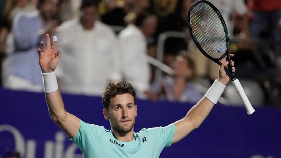 Casper Ruud, of Norway, celebrates after defeating Holger Rune, of Denmark. (AP)