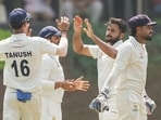 Mumbai's Shardul Thakur celebrates with teammates after taking the wicket of Tamil Nadu's Vijay Shankar 