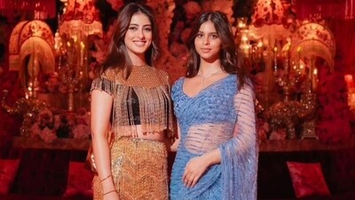 Suhana Khan attended the event with her family members. She wore a blue saree and matching blouse for the event. Suhana and her friend Navya Nanda also gave different poses for the camera. Navya was seen in a black and golden outfit. Suhana Khan attended the event with her family members. She wore a blue saree and matching blouse for the event. Suhana and her friend Navya Nanda also gave different poses for the camera. Navya was seen in a black and golden outfit.