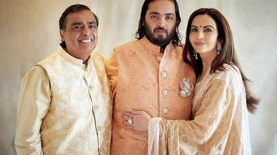 Reliance Industries Chairman Mukesh Ambani poses for a picture with Reliance Foundation Founder and Chairperson and his wife Nita Ambani and their son Anant Ambani during the pre-wedding bash of their son with Radhika Merchant in Jamnagar on Saturday. (ANI) Reliance Industries Chairman Mukesh Ambani poses for a picture with Reliance Foundation Founder and Chairperson and his wife Nita Ambani and their son Anant Ambani during the pre-wedding bash of their son with Radhika Merchant in Jamnagar on Saturday. (ANI)