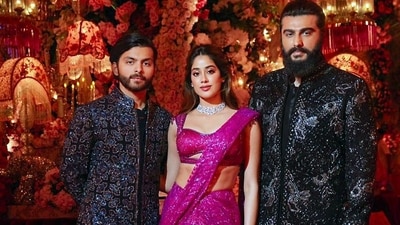 Janhvi Kapoor looked breathtakingly beautiful in a hot-pink sequin-covered signature party-ready drape, which she paired with a matching sleeveless bralette-style blouse. (ANI) Janhvi Kapoor looked breathtakingly beautiful in a hot-pink sequin-covered signature party-ready drape, which she paired with a matching sleeveless bralette-style blouse. (ANI)