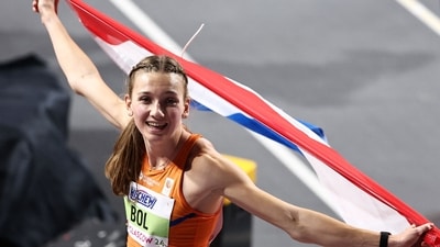 First-placed Netherlands' Femke Bol celebrates after winning the Women's 400m final during the Indoor World Athletics Championships in Glasgow. (AFP)