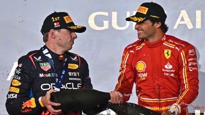 First placed Red Bull Racing's Dutch driver Max Verstappen (L) and third placed Ferrari's Spanish driver Carlos Sainz Jr celebrate during the podium ceremony (AFP) First placed Red Bull Racing's Dutch driver Max Verstappen (L) and third placed Ferrari's Spanish driver Carlos Sainz Jr celebrate during the podium ceremony (AFP)
