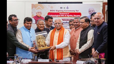 Haryana Chief Minister Manohar Lal Khattar being presented a memento during the signing of MoU regarding development of Agroha archaeological site between ASI and Department of Archaeology & Museums (Haryana), in New Delhi on Sunday. (PTI) Haryana Chief Minister Manohar Lal Khattar being presented a memento during the signing of MoU regarding development of Agroha archaeological site between ASI and Department of Archaeology & Museums (Haryana), in New Delhi on Sunday. (PTI)