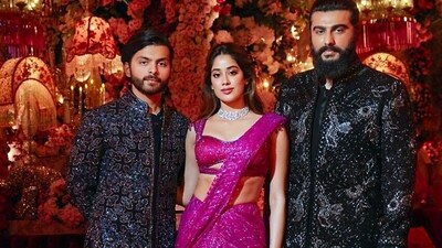 Janhvi Kapoor looked stunning in purple as she posed for a click with her boyfriend Shikhar Paharia and brother Arjun Kapoor at the pre-wedding bash of Anant Ambani with Radhika Merchant. (ANI Picture Service)