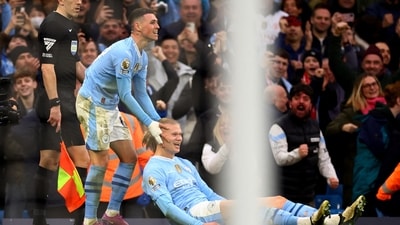 Manchester City's Erling Braut Haaland celebrates scoring their third goal with Phil Foden (REUTERS)