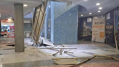 The persons died after decoration material including - 50 iron rods each 5 to 10 Kg and plywood - fell upon them at Galaxy Blue Sapphire Plaza Mall. (HT Photo) The persons died after decoration material including - 50 iron rods each 5 to 10 Kg and plywood - fell upon them at Galaxy Blue Sapphire Plaza Mall. (HT Photo)