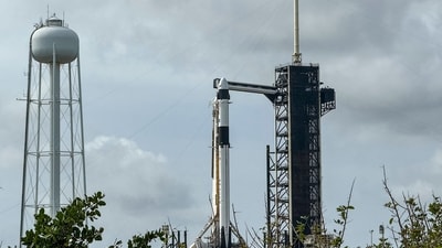 A SpaceX Falcon 9 rocket with the Dragon capsule sits at launch pad LC-39A at Kennedy Space Center (AFP)