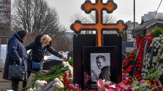 Russian opposition leader Alexei Navalny's mother, Lyudmila Navalnaya, left, and his mother-in-law Alla Abrosimova visit the grave of Alexei Navalny after his yesterday funeral at the Borisovskoye Cemetery, in Moscow, Russia, on Saturday, March 2, 2024. Navalny, who was President Vladimir Putin's fiercest foe, was buried after a funeral that drew thousands of mourners amid a heavy police presence. (AP)