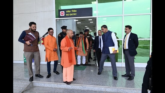 CM Yogi Adityanath instructing officials to put up digital dashboards at airport to display handicraft items of Azamgarh (HT photo)