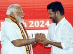 Prime Minister Narendra Modi being greeted by Telangana CM Revanth Reddy at the inauguration of multiple development projects in Adilabad on Monday. Prime Minister Narendra Modi being greeted by Telangana CM Revanth Reddy at the inauguration of multiple development projects in Adilabad on Monday.