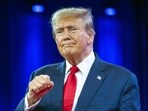 FILE - Republican presidential candidate former President Donald Trump pumps his fist as he departs after speaking during the Conservative Political Action Conference, CPAC 2024, at National Harbor, in Oxon Hill, Md., Feb. 24, 2024. (AP Photo/Alex Brandon, File)
