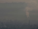 Smoke rises from a brick kiln during a smoggy morning in Kathmandu, Nepal. Is smog as bad as smoke? Expert on tips for minimising health risks from smog pollution 