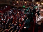 Mps and senators applaud after President of the National Assembly Yael Braun-Pivet announced the result of the vote to anchor the right to abortion in the country's constitution.