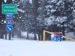 TRUCKEE, CALIFORNIA - MARCH 03: An Interstate 80 (I-80) entrance is covered in snow during a powerful multiple day winter storm in the Sierra Nevada mountains on March 03, 2024 in Truckee, California. A stretch of Interstate 80 in California remains shut down in both directions due to the storm. Blizzard warnings were issued with snowfall of up to 12 feet expected in some higher elevation locations. Mario Tama/Getty Images/AFP (Photo by MARIO TAMA / GETTY IMAGES NORTH AMERICA / Getty Images via AFP) TRUCKEE, CALIFORNIA - MARCH 03: An Interstate 80 (I-80) entrance is covered in snow during a powerful multiple day winter storm in the Sierra Nevada mountains on March 03, 2024 in Truckee, California. A stretch of Interstate 80 in California remains shut down in both directions due to the storm. Blizzard warnings were issued with snowfall of up to 12 feet expected in some higher elevation locations. Mario Tama/Getty Images/AFP (Photo by MARIO TAMA / GETTY IMAGES NORTH AMERICA / Getty Images via AFP)