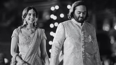 Anant Ambani wore a light green sherwani and cream pants. Radhika Merchant was seen in a beige and golden saree. Anant Ambani wore a light green sherwani and cream pants. Radhika Merchant was seen in a beige and golden saree.