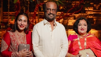 Superstar Rajinikanth opted for a white shirt which he paired with a beige veshti. His wife Latha Rajinikanth wore an orange saree while their daughter Aishwarya Rajinikanth was seen in a red and golden suit. Superstar Rajinikanth opted for a white shirt which he paired with a beige veshti. His wife Latha Rajinikanth wore an orange saree while their daughter Aishwarya Rajinikanth was seen in a red and golden suit.