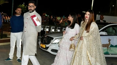 Abhishek Bachchan wore a grey and white traditional outfit. Aishwarya Rai opted for a cream and golden suit. Aaradhya Bachchan wore a white and pink dress. She also ditched her bangs and opted for a new hairstyle. Abhishek Bachchan wore a grey and white traditional outfit. Aishwarya Rai opted for a cream and golden suit. Aaradhya Bachchan wore a white and pink dress. She also ditched her bangs and opted for a new hairstyle.