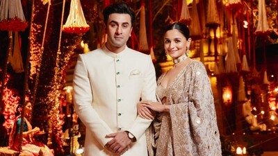 Ranbir Kapoor and Alia Bhatt looked cute in traditional outfits. He wore a cream-coloured sherwani. Alia looked beautiful in an embellished lehenga in gold and beige hue. Ranbir Kapoor and Alia Bhatt looked cute in traditional outfits. He wore a cream-coloured sherwani. Alia looked beautiful in an embellished lehenga in gold and beige hue.