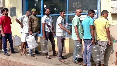People stand in queues to get drinking water as areas like Whitefield, Mahadevpura and RR Nagar face drinking water shortages. (ANI) People stand in queues to get drinking water as areas like Whitefield, Mahadevpura and RR Nagar face drinking water shortages. (ANI)