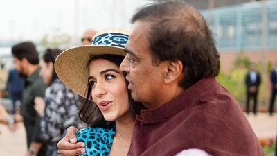Reliance Industries Chairman Mukesh Ambani shares a light moment with Radhika Merchant during the pre-wedding festivities of his son Anant Ambani and Radhika Merchant, in Jamnagar. (ANI) Reliance Industries Chairman Mukesh Ambani shares a light moment with Radhika Merchant during the pre-wedding festivities of his son Anant Ambani and Radhika Merchant, in Jamnagar. (ANI)