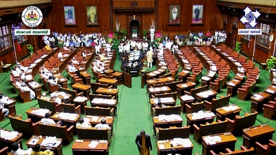 Karnataka Bharatiya Janata Party (BJP) MLAs stage a protest against the state government over an alleged video of pro-Pakistan slogans by the supporters of Congress MP Syed Naseer Hussain during the State Assembly Session at Vidhana Soudha in Bengaluru on Thursday. (ANI) Karnataka Bharatiya Janata Party (BJP) MLAs stage a protest against the state government over an alleged video of pro-Pakistan slogans by the supporters of Congress MP Syed Naseer Hussain during the State Assembly Session at Vidhana Soudha in Bengaluru on Thursday. (ANI)