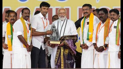 Prime Minister Narendra Modi being felicitated during a public meeting at Nandanam YMCA Ground in Chennai. (PTI) Prime Minister Narendra Modi being felicitated during a public meeting at Nandanam YMCA Ground in Chennai. (PTI)