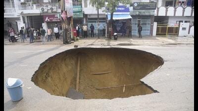 Road cave-in at Vikas Nagar after heavy rainfall in Lucknow, on Sunday. (Sourced) Road cave-in at Vikas Nagar after heavy rainfall in Lucknow, on Sunday. (Sourced)