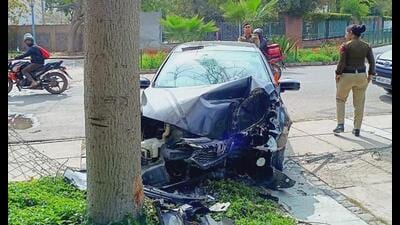 The car after it rammed into a tree. (HT Photo) The car after it rammed into a tree. (HT Photo)