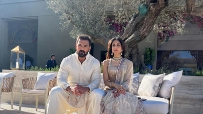 John Abraham with wife Priya Runchal in Jamnagar. John Abraham with wife Priya Runchal in Jamnagar.