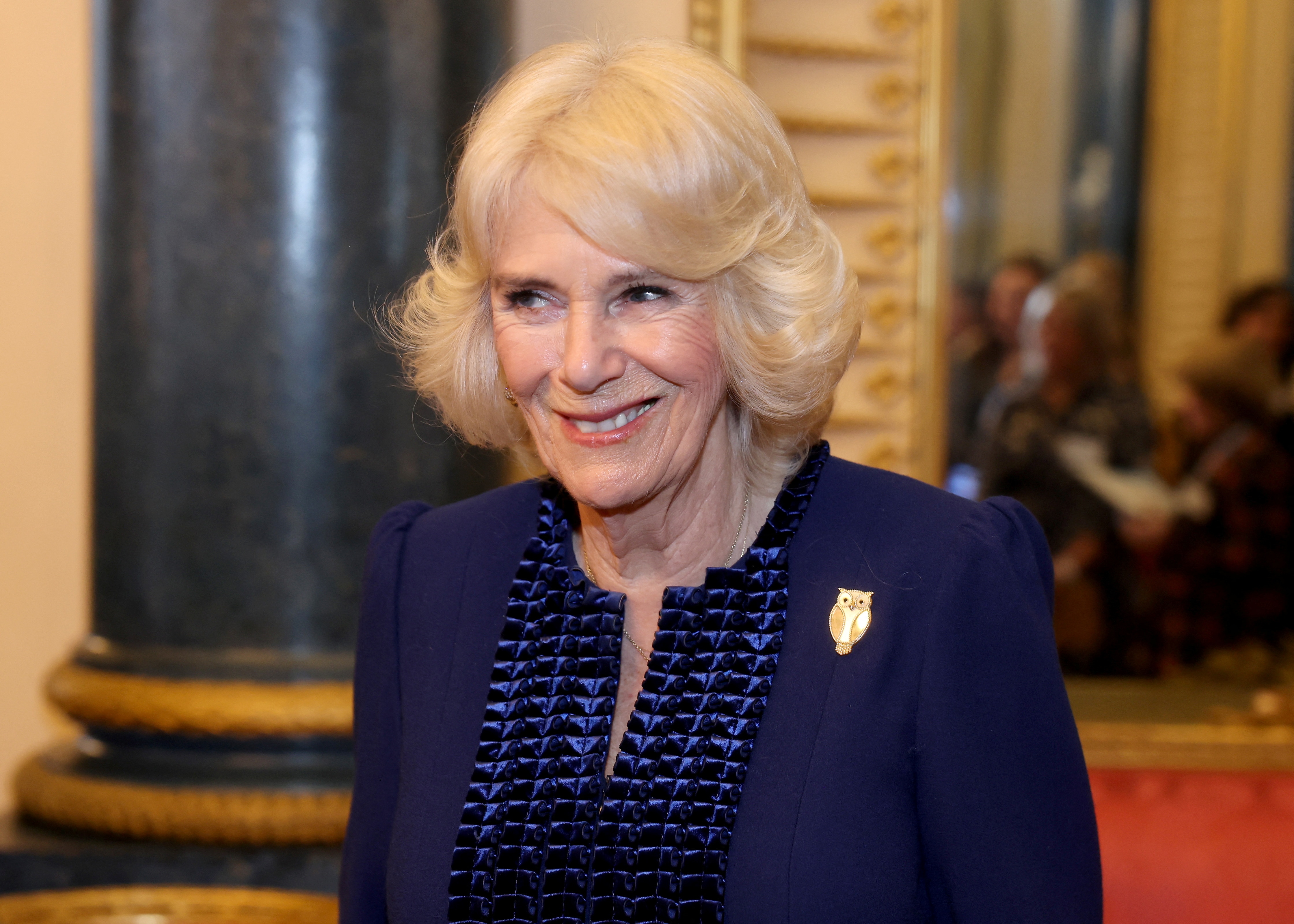Britain's Queen Camilla smiles during a reception for the BBC's 500 Words Finalists at Buckingham Palace on February 28, 2024 in London, Britain (Chris Jackson/Pool via REUTERS) (via REUTERS)