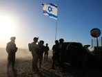 Troops gather at southern Israel near the border with the Gaza Strip
on March 4. Troops gather at southern Israel near the border with the Gaza Strip
on March 4.