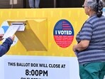 TOPSHOT - Women drop off their ballots into a ballot box on March 4, 2024 at the Los Angeles County Registrar in Norwalk, California ahead of the Primary election on "Super Tuesday," March 5. TOPSHOT - Women drop off their ballots into a ballot box on March 4, 2024 at the Los Angeles County Registrar in Norwalk, California ahead of the Primary election on "Super Tuesday," March 5.
