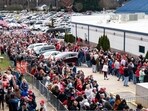 Attendees wait in line ahead of a "Get Out The Vote" rally with former US President Donald Trump in Greensboro, North Carolina, US, on Saturday, March 2, 2024. Trump�said he will impose tit-for-tat tariffs if he is reelected president, reiterating one of his isolationist policy goals that has already raised concern�at home�and overseas.� Photographer: Al Drago/Bloomberg Attendees wait in line ahead of a "Get Out The Vote" rally with former US President Donald Trump in Greensboro, North Carolina, US, on Saturday, March 2, 2024. Trump�said he will impose tit-for-tat tariffs if he is reelected president, reiterating one of his isolationist policy goals that has already raised concern�at home�and overseas.� Photographer: Al Drago/Bloomberg