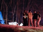 Emergency officials work the scene of a fatal small plane crash alongside Interstate 40 near mile marker 202, Monday, March 4, 2024, in Nashville, Tenn. (AP Photo/George Walker IV)