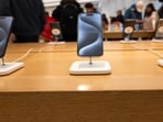 An Apple store stands in a shopping mall An Apple store stands in a shopping mall