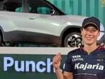 Ellyse Perry standing in front of the car her six damaged during last night's game Ellyse Perry standing in front of the car her six damaged during last night's game