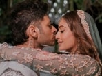 Surbhi Chandna gets a kiss from Karan Sharma in one of wedding photos. Surbhi Chandna gets a kiss from Karan Sharma in one of wedding photos.