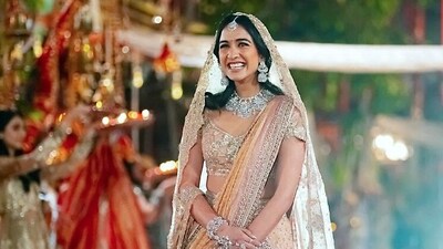 Bride-to-be Radhika Merchant gets teary-eyed as she walks down the aisle at the Hastakshar ceremony. (ANI) Bride-to-be Radhika Merchant gets teary-eyed as she walks down the aisle at the Hastakshar ceremony. (ANI)