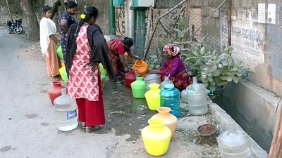Bengaluru, Mar 05 (ANI): People wait for their turn to fill their gallons with running water for their basic needs after the Silicon City area faces a severe water crisis, in Bengaluru on Tuesday. (ANI Photo) Bengaluru, Mar 05 (ANI): People wait for their turn to fill their gallons with running water for their basic needs after the Silicon City area faces a severe water crisis, in Bengaluru on Tuesday. (ANI Photo)
