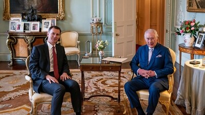 Britain's King Charles III and Britain's Chancellor of the Exchequer Jeremy Hunt, pose for a photograph during their meeting in the private audience room at Buckingham Palace in London on March 5, 2024. (Photo by Aaron Chown / POOL / AFP) (AFP) Britain's King Charles III and Britain's Chancellor of the Exchequer Jeremy Hunt, pose for a photograph during their meeting in the private audience room at Buckingham Palace in London on March 5, 2024. (Photo by Aaron Chown / POOL / AFP) (AFP)